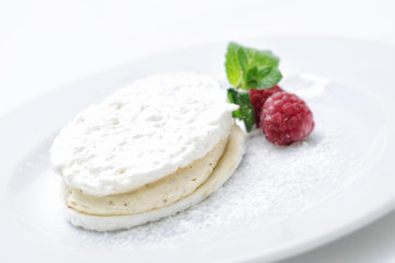 coconut cream with raspberries on white plate, patisserie, sweet dessert, on-line shop photography