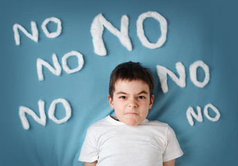 bad boy on blue blanket background