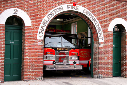 US city fire department building with fire truck.
