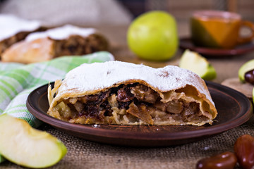 Apple strudel or apple pie  with dates and cinnamon