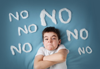 bad boy on blue blanket background