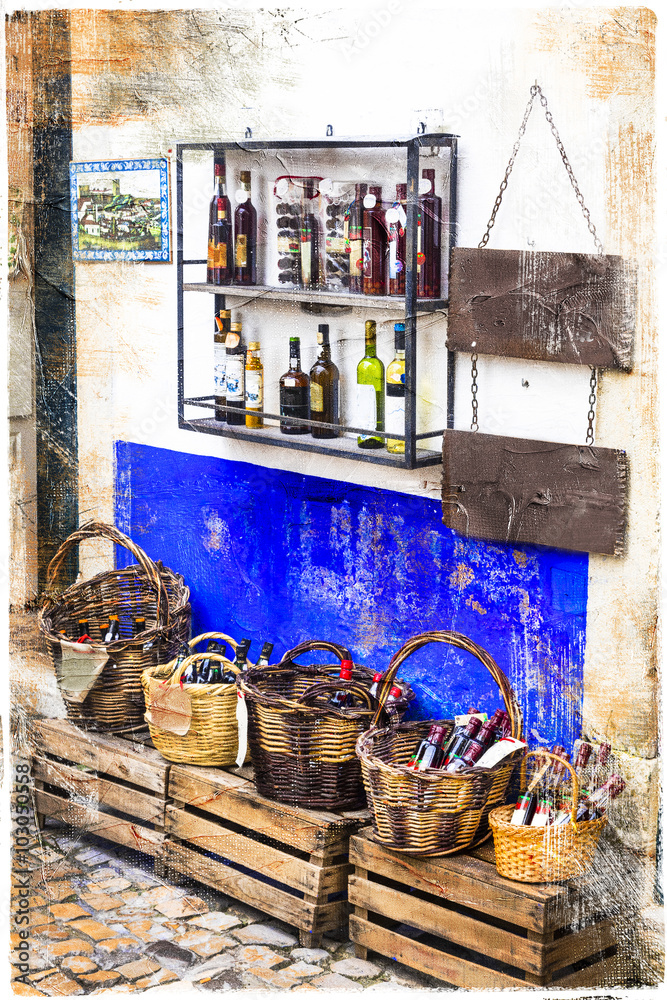 Wall mural colorful shops of old town obidos in portugal, artistic picture