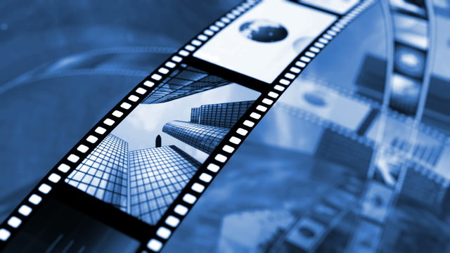 Animated rotating film reels. Black and blue 4K