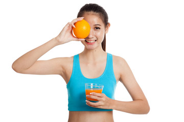 Fototapeta premium Beautiful Asian healthy girl with orange juice and orange fruit