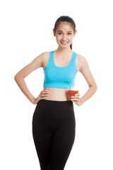 Fototapeta premium Beautiful healthy Asian girl with tomato juice