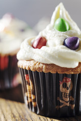 Creamy cupcakes with color drops