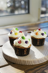 Creamy cupcakes with color drops