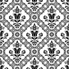 Damask seamless ornament. Traditional pattern. Classic oriental black and white background