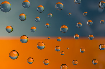 drops of water on blue orange background