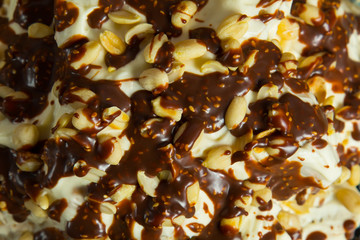 Chocolate cake with cream and nuts