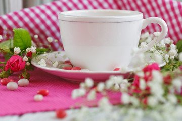 Cup of tea and roses