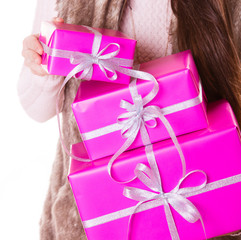 Pretty fashion woman with boxes gifts. Christmas.