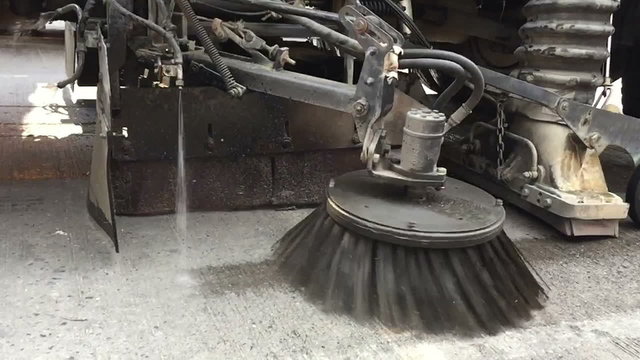 slow motion street sweeper machine cleaning the streets in Thailand