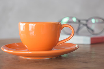 Orange mug cup of coffee
