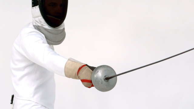 Sportsman playing fencing
