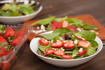 Strawberry and spinach salad in a bowl