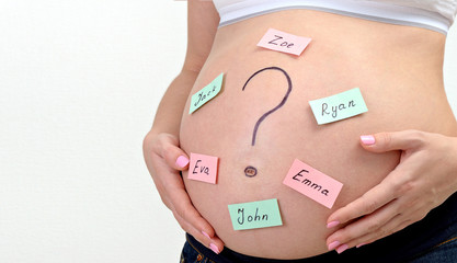 pregnant belly with names