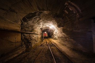 Underground gold mine ore tuneel with rails Berezovsky mine Ural