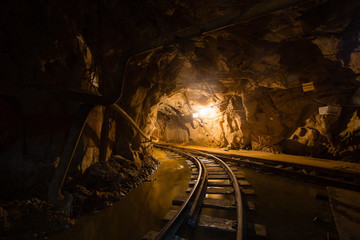 Underground gold mine ore tuneel with rails Berezovsky mine Ural