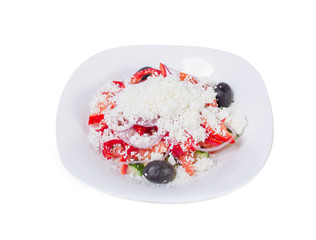 Fresh vegetable salad with grated cheese.