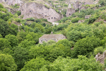 Mountain scenery in Armenia. Ancient cave city in the rock. 