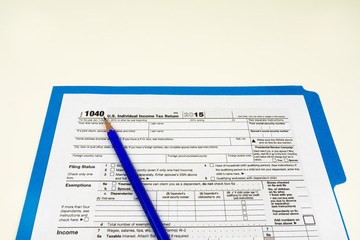 Fototapeta premium Tax Form 1040, Tax Form Details with Light Background