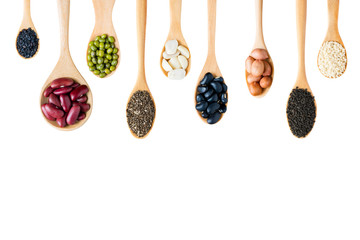 Group of beans or lentils and whole grains seeds in spoon made w