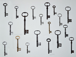 19 Antique Keys on a white background