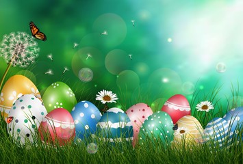 Easter eggs in meadow with sun rays on green background