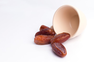 Dried dates fruit on white background
