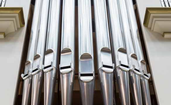 Close-up of modern steel organ pipe 