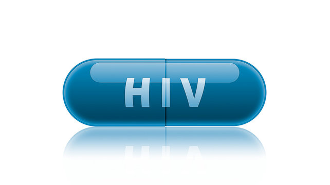Single blue medicine capsule labeled HIV.