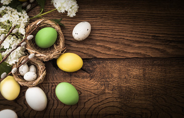 Easter eggs on wood background - 103082777