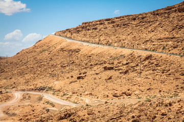 A village at an oasis at the bottom of a canyon in the Atlas mou