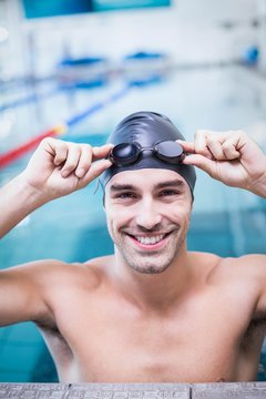 Handsome Man Wearing Swim Cap And Goggles