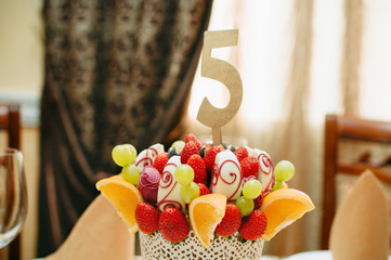 Fruit bouquet decoration on the dining table