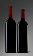Two red wine bottles