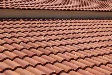brown tile roof weathered on building residential