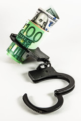  euros,dollars and handcuffs