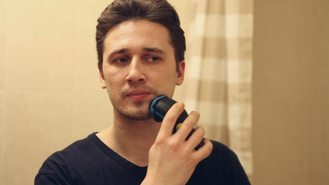 Man Shave Electric Razor Close Up