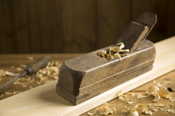 vintage wooden planer / portrait of an old carpenter's plane 