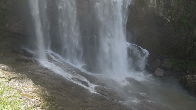 Fast waterfall in rocky mountains of Sri Lanka