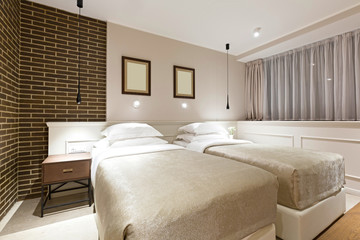 Modern double bed hotel bedroom interior