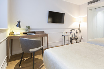 Interior of a double hotel bedroom in the morning