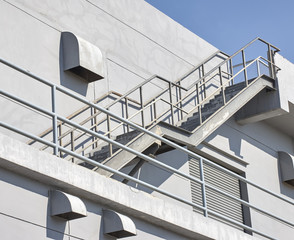 Steel staircase with plaster wall