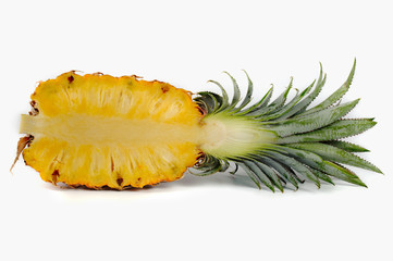 Pineapple cut in half on  white background isolated