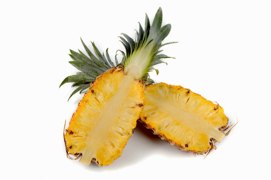 Two halves of pineapple. isolated on white