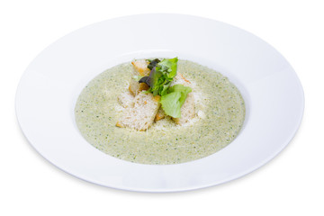 Broccoli cream soup with roasted rusks, isolated