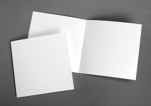 White empty  cards on grey to replace your design.