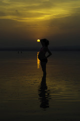 Fototapeta premium pregnant at sunset.